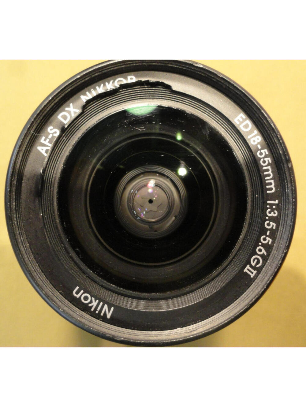 NIKON DX SWM ED ASPHERICAL 0.28M/0.92FT 52 US 6766543 18-55 MM 1:3.5-5.6 G II